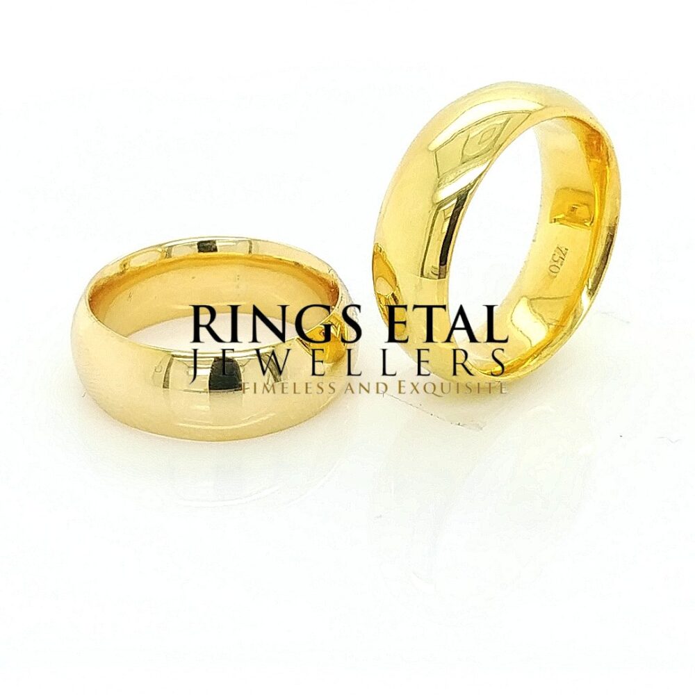 Classic, Plain halo 8mm wedding band in 18 karats yellow gold