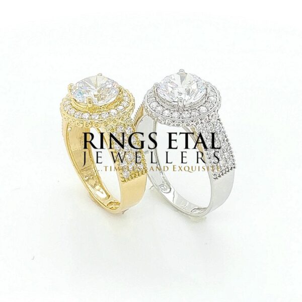 Round shape , single halo, Topsy engagement ring with A++++ cubic Zirconia stones in 18 karats yellow gold