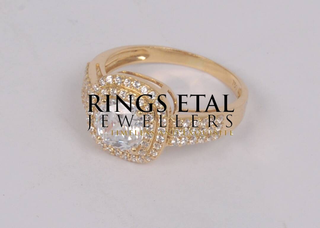 Topsy double halo engagement ring with three lines cubic zirconia