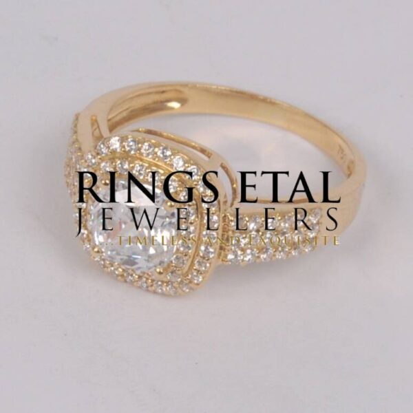 Topsy double halo engagement ring